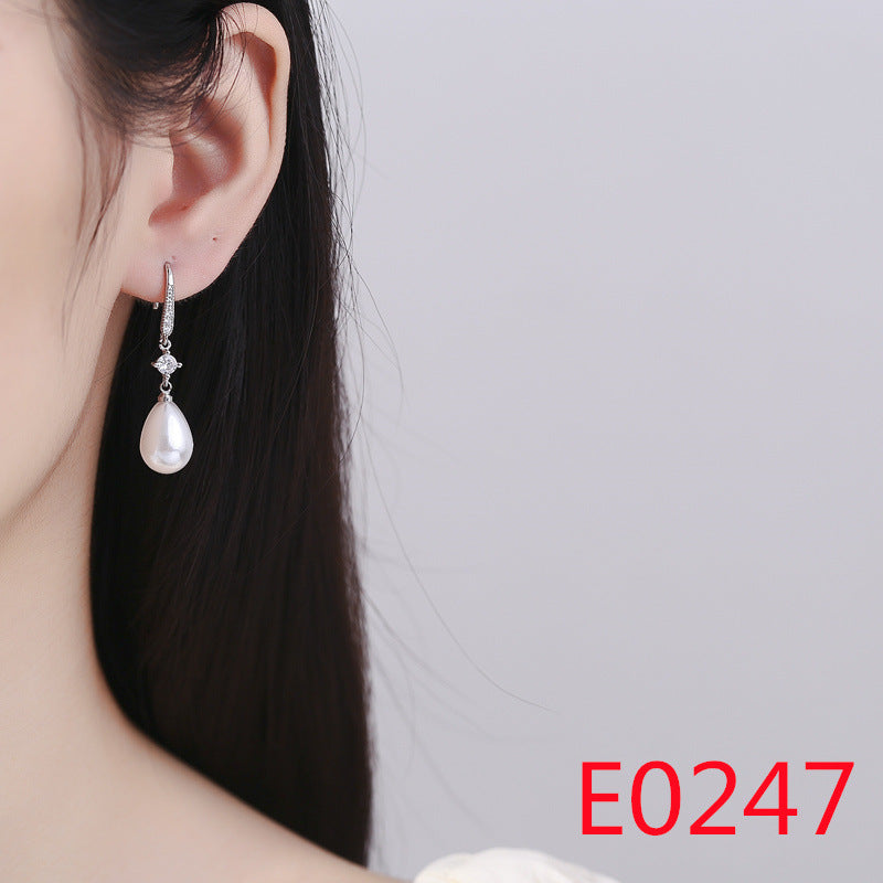 1 Pair Elegant Streetwear U Shape Round Inlay Copper Artificial Pearls Zircon Drop Earrings