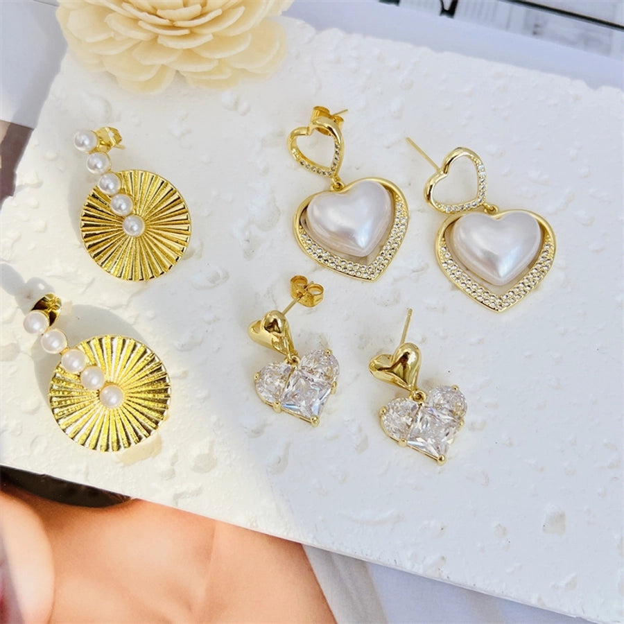 1 Pair Modern Style Simple Style Streetwear Solid Color Inlay Copper Imitation Pearl Zircon 18K Gold Plated Drop Earrings