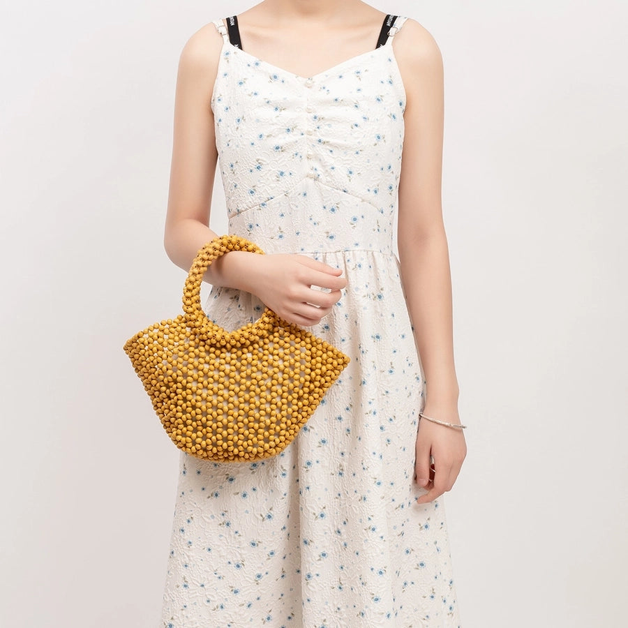 Women's Medium Maple Solid Color Elegant Streetwear Beading Dumpling Shape String Straw Bag