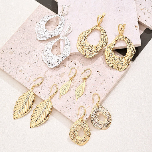 1 Pair/Package Exaggerated Modern Style Simple Style Irregular Leaves Handmade Polishing Plating Copper 18K Gold Plated White Gold Plated Earrings