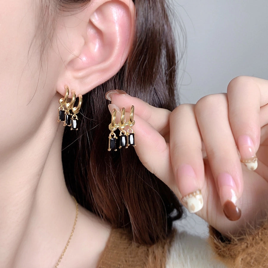 Fashion personality copper plated gold inlaid zircon tassel earrings niche lightweight metal style earrings popular trendy jewelry